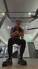 Joan Poh wears the Amara Keepsake Necklace in a gym video.